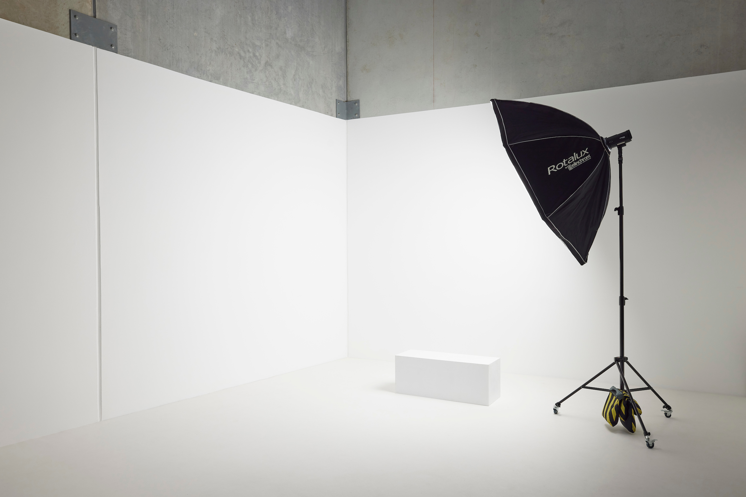 Large Studio space with white walls and black light box