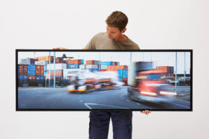Commercial photographer Matt Reed reviewing a commissioned photo, illustrating photography ownership and copyright in professional photography.