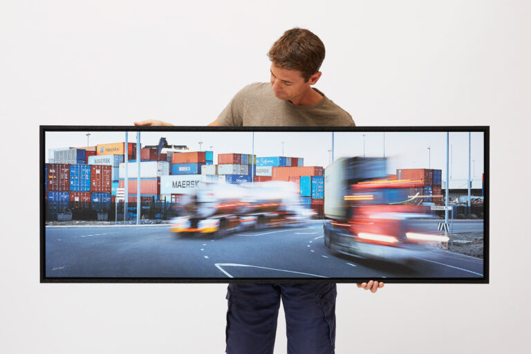 Commercial photographer Matt Reed reviewing a commissioned photo, illustrating photography ownership and copyright in professional photography.
